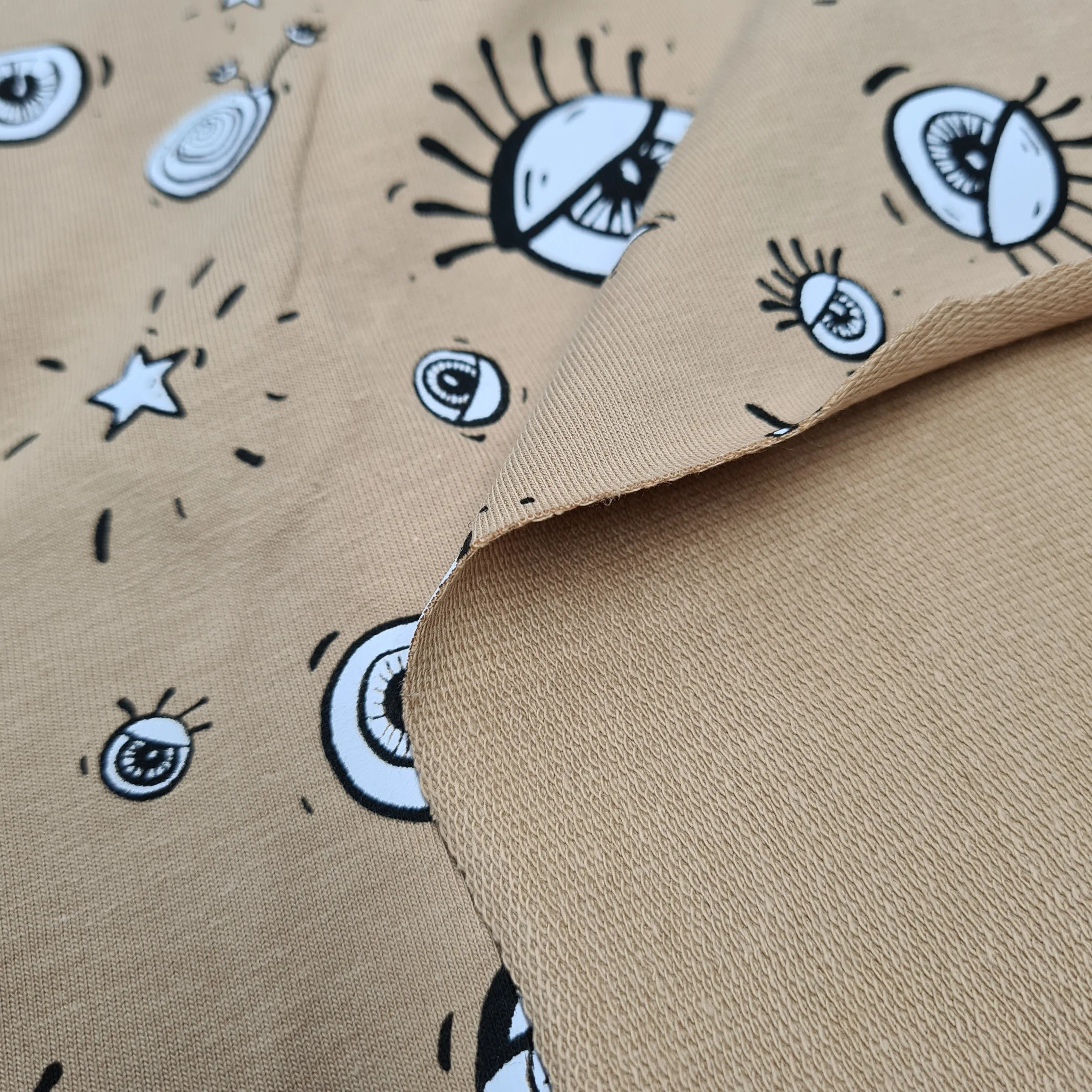 All Eyes On Me Beige French Terry Jersey, priced by half metre