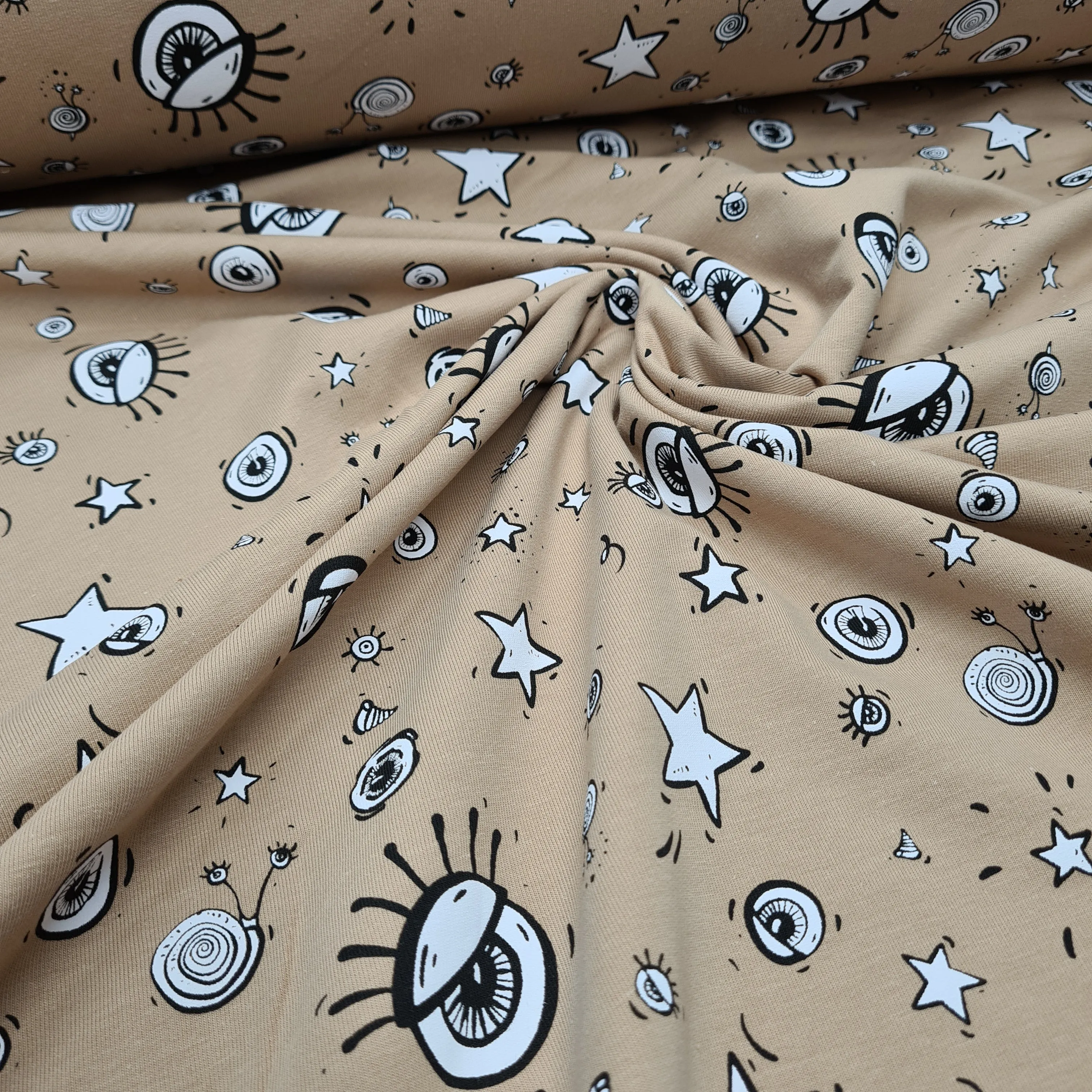 All Eyes On Me Beige French Terry Jersey, priced by half metre