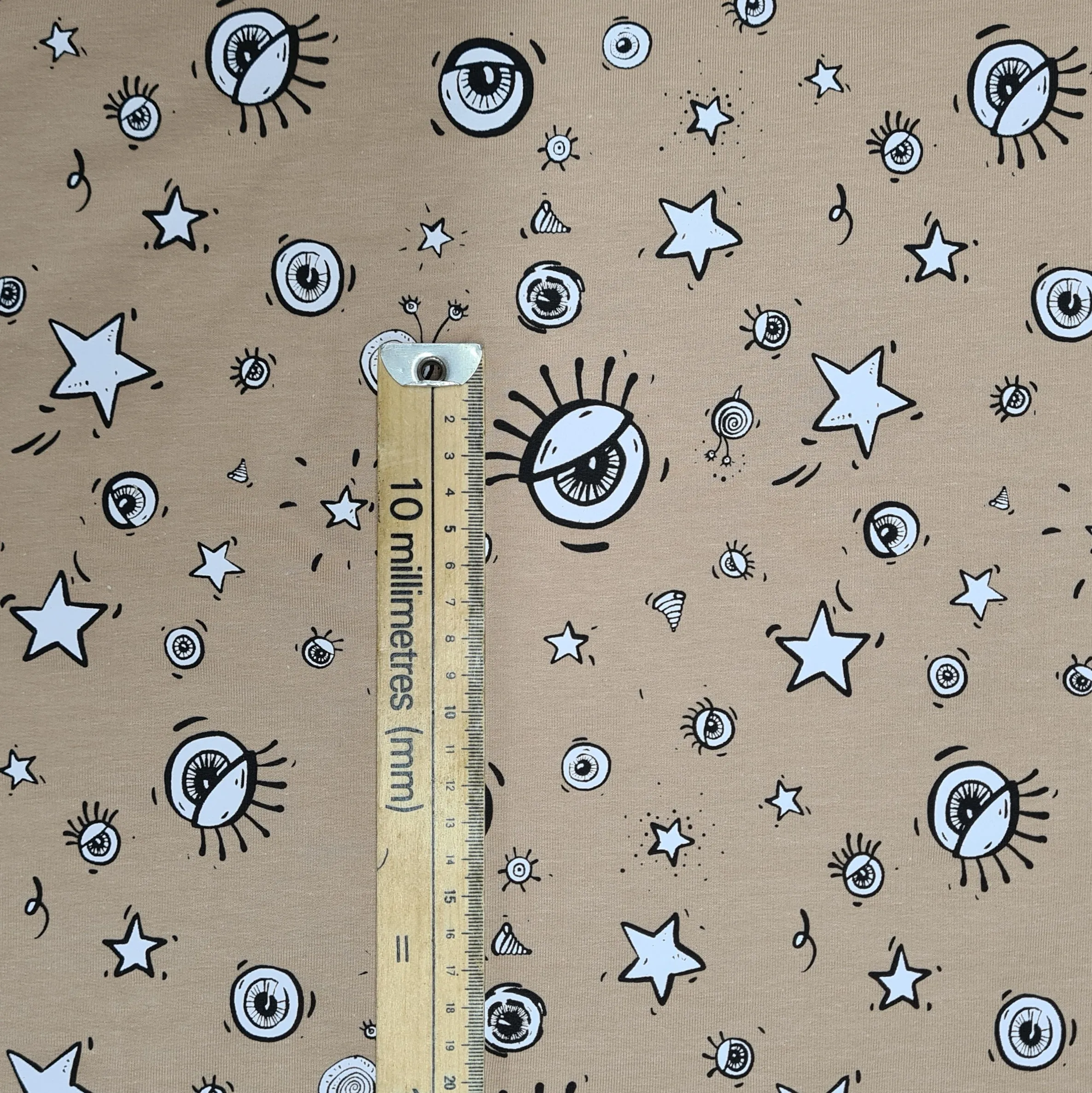 All Eyes On Me Beige French Terry Jersey, priced by half metre