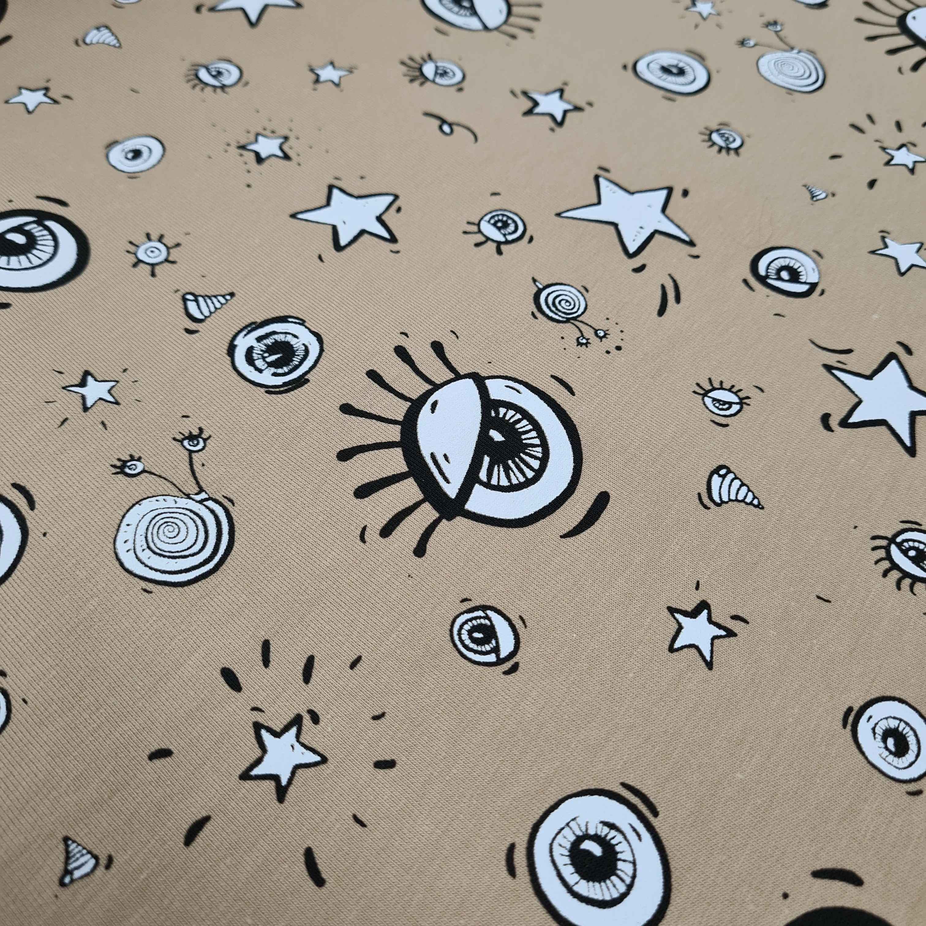 All Eyes On Me Beige French Terry Jersey, priced by half metre