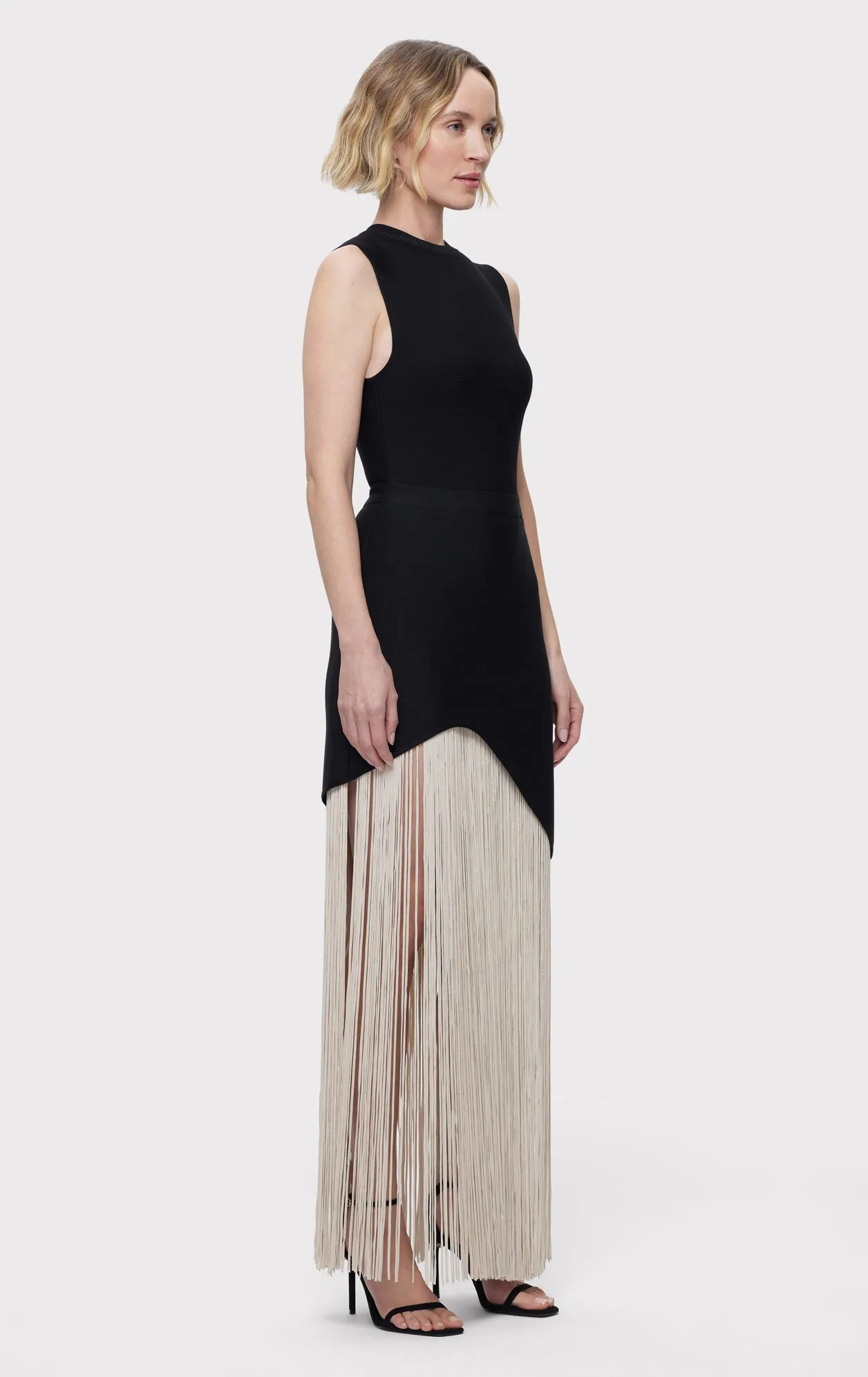 CREW NECK S/L ASYMMETRIC HEM FRINGE GOWN
